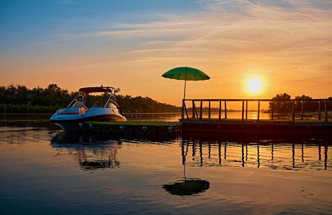 boat on water at sunset